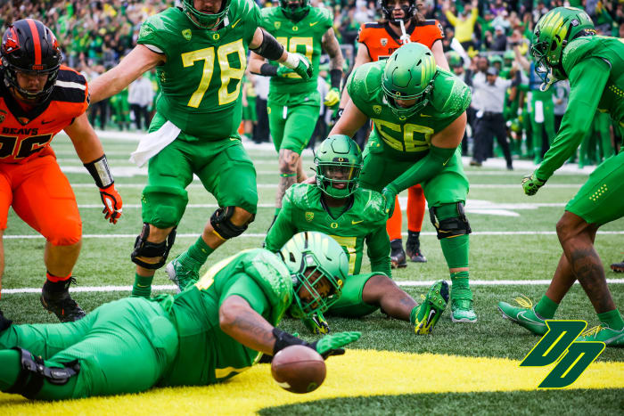 Brown celebrates a touchdown run with teammates.